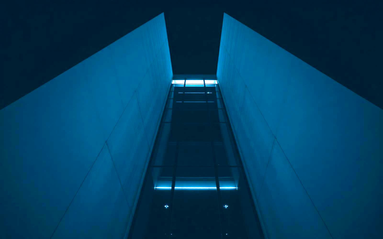 Modern commercial building exterior at night